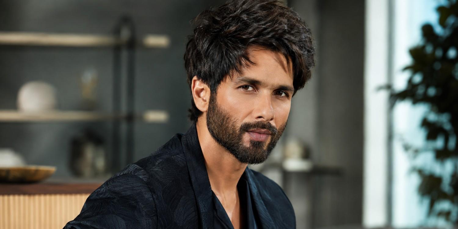 Shahid Kapoor height profile with a black outfit and indoor setting